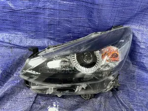 Mazda Demio Headlights