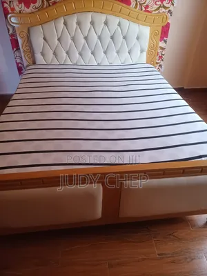 5 by 6 Hard Wood Bed