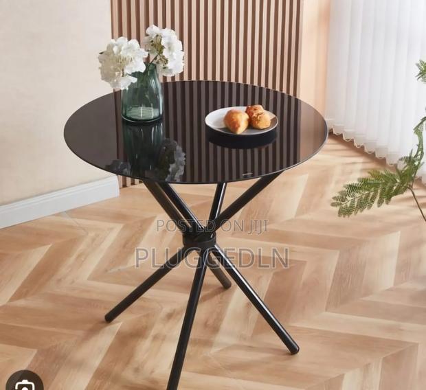 Glass Round Dining Table. - main view