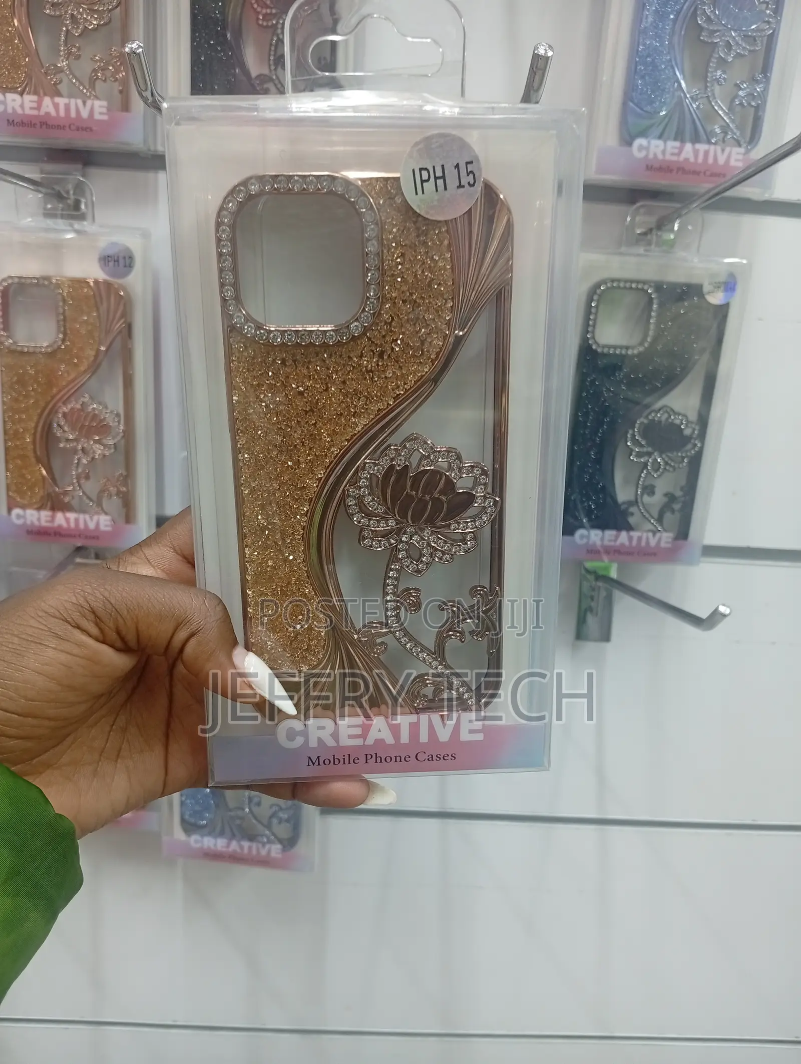 iPhone 15, Featuring Glitter, Crystals, and a Floral Design Case