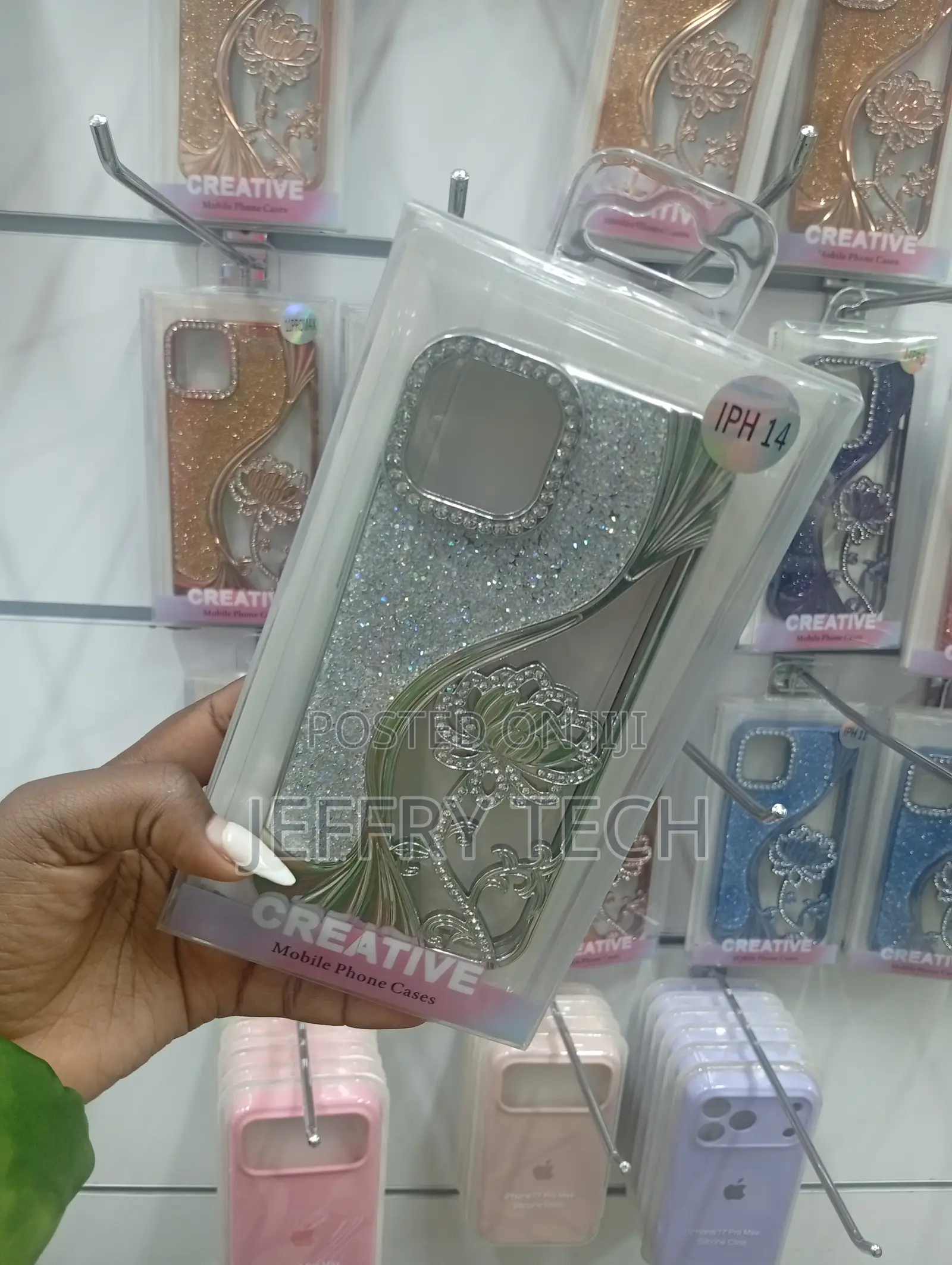 iPhone 14 Creative Brand Phone Case With a Decorative Silver Finish