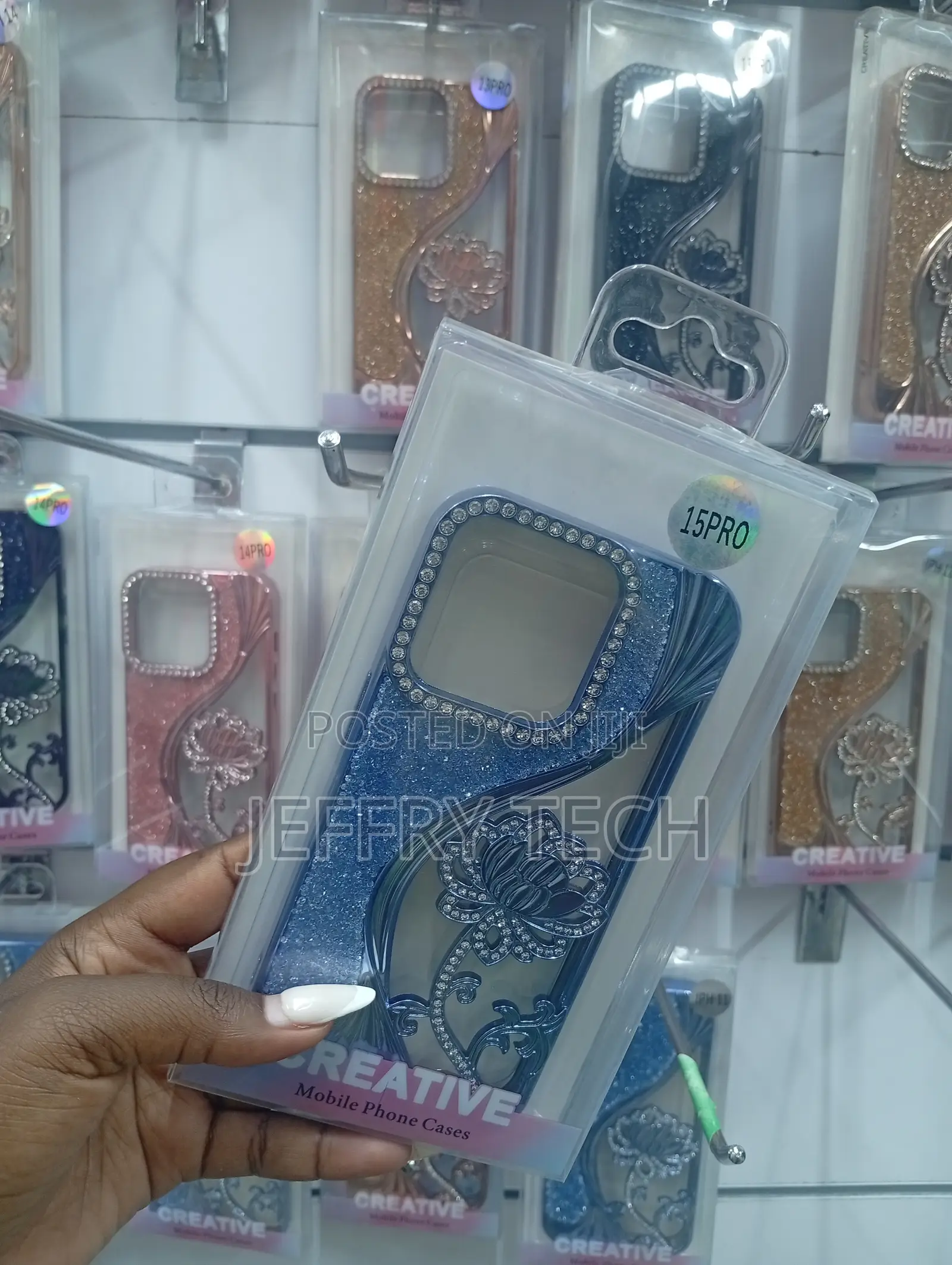iPhone 15 Pro,Featuring Rhinestones and Floral Designs Case