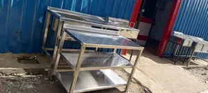 Stainless Steel Warking Top With Under Shelves.