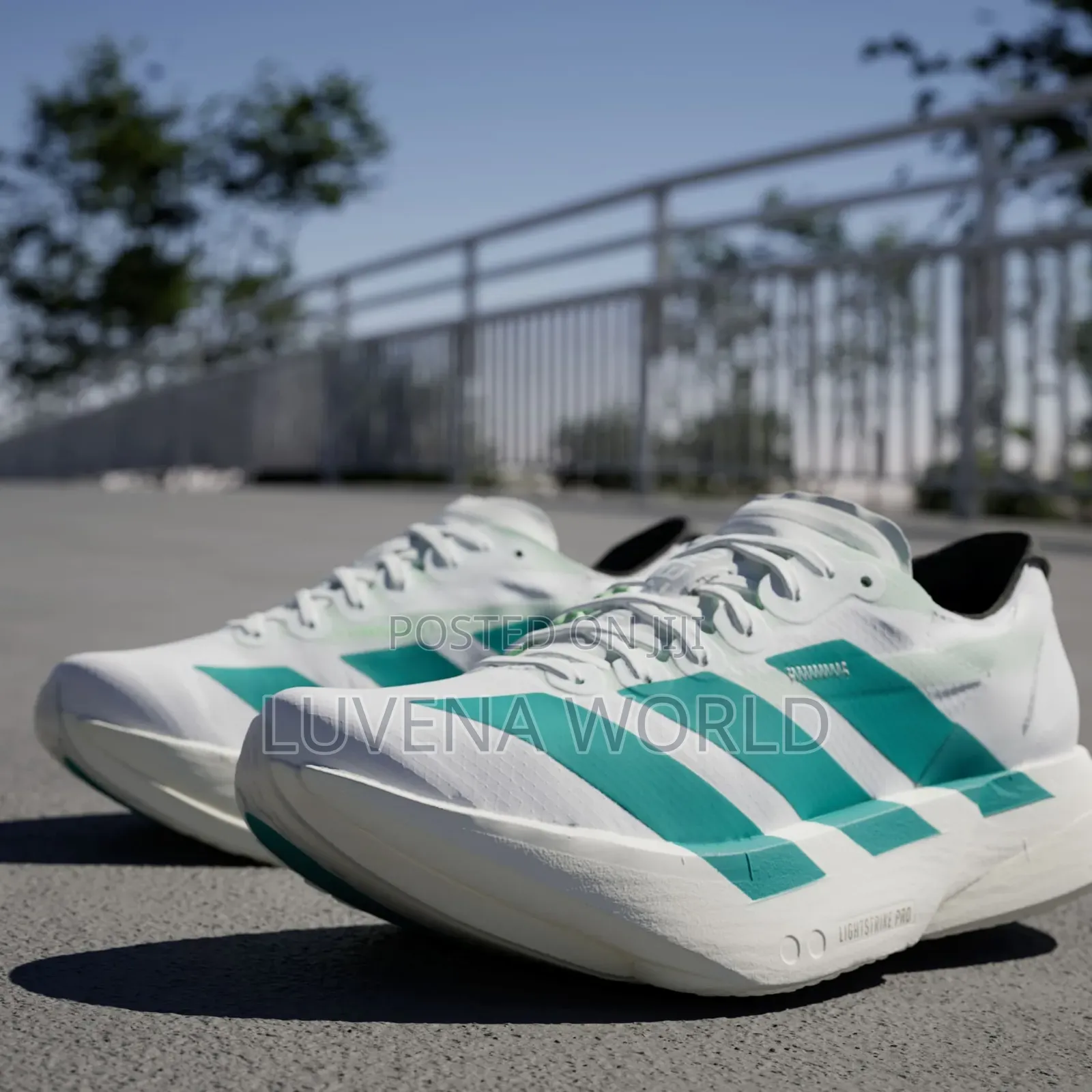 White Green Adidas Adizero Pro 4
