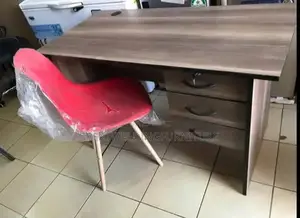 Red Eames Office Chair Plus Desk