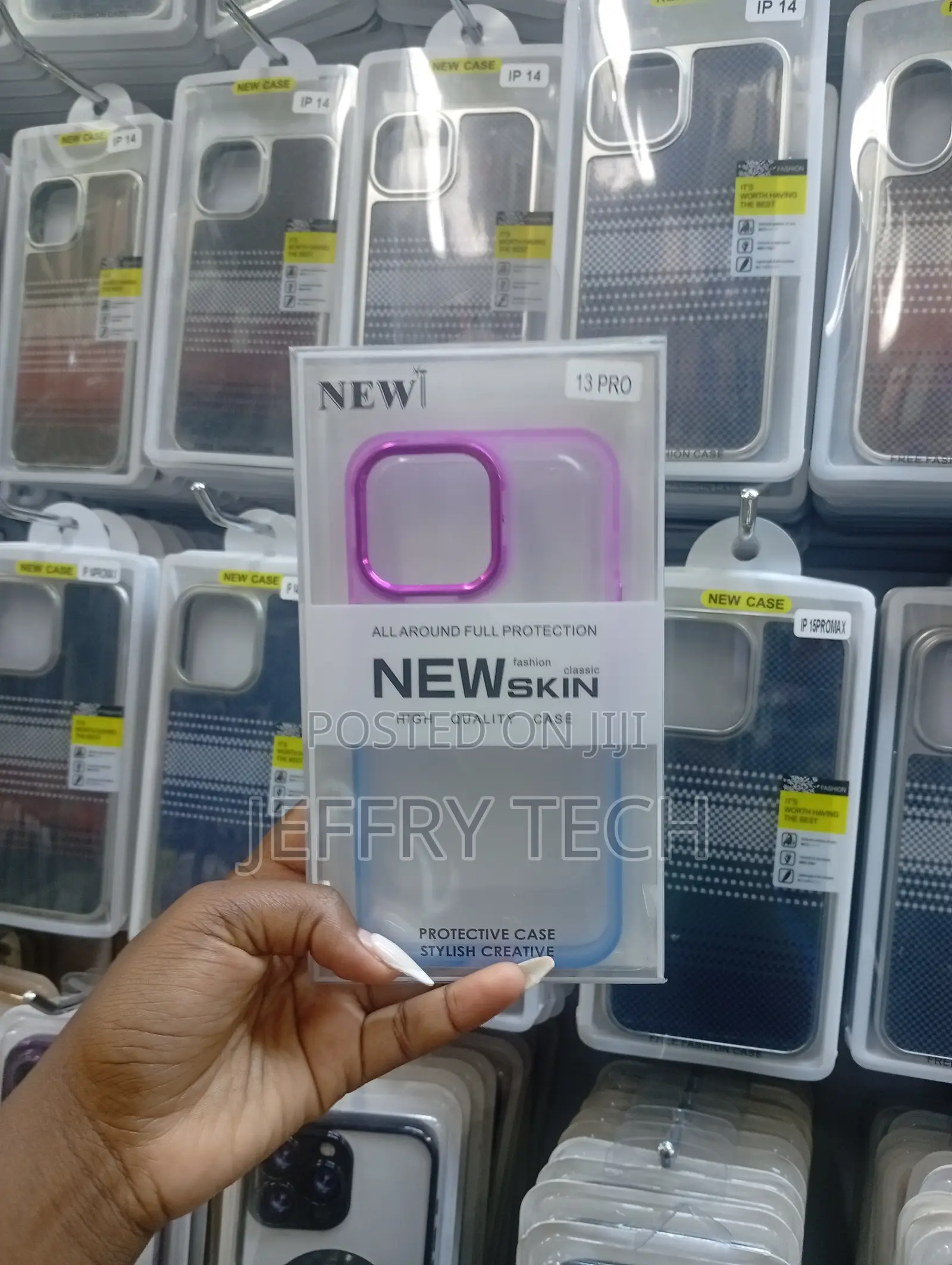 New Skin" Brand Protective Phone Case for the iPhone 13 Pro.