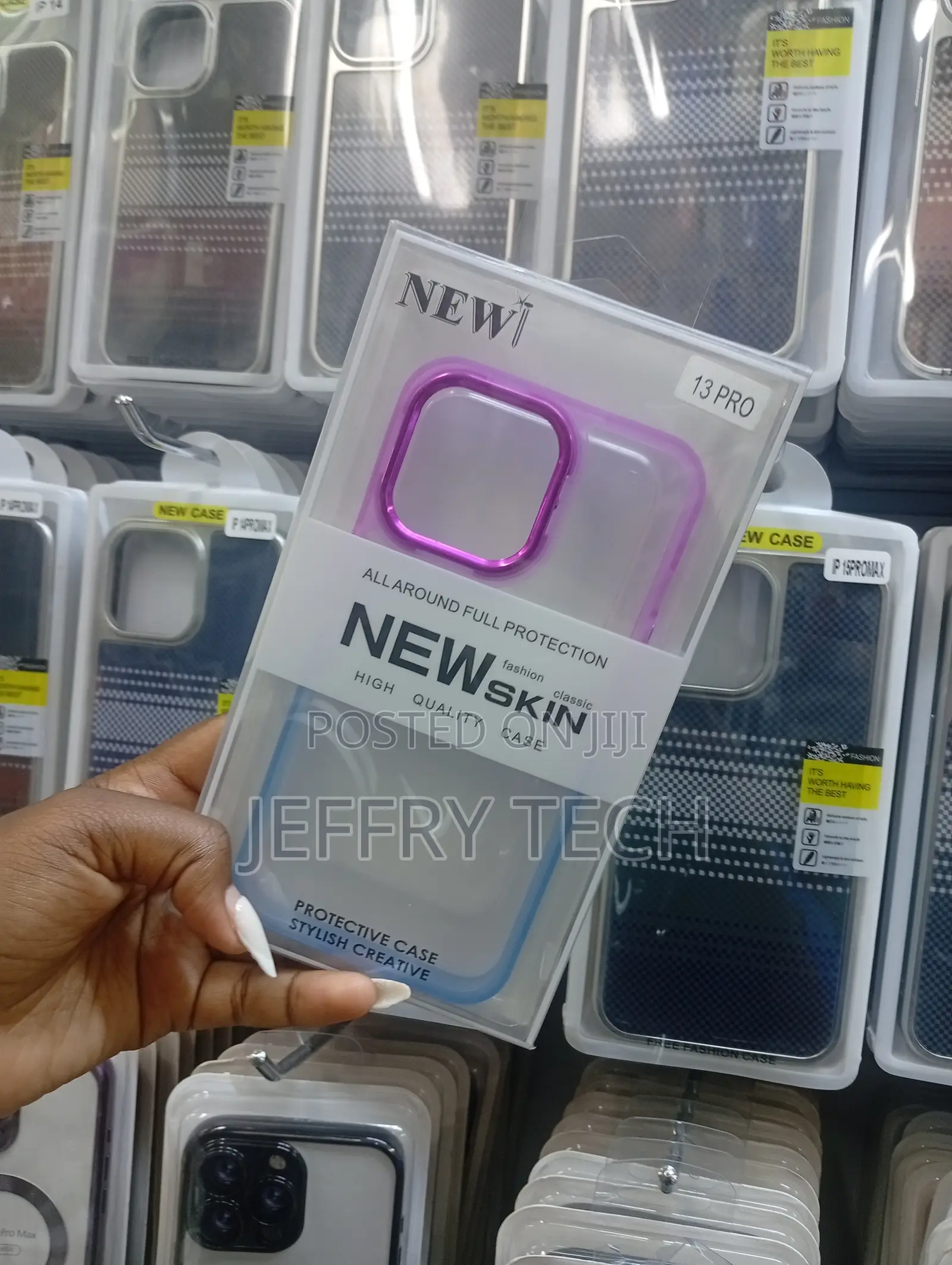 New Skin" Brand Protective Phone Case for the iPhone 13 Pro.