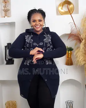 Ladies Knit Cardigan With a Hood and a Beautiful Floral Pattern.