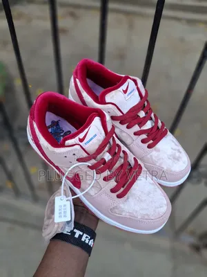 Strange Love Nike Dunks in "Pink and Maroon Colourway"