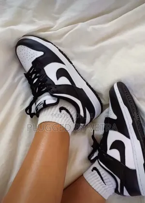 Nike Dunk Low Retro in Popular "Panda" White and Black Colorway.