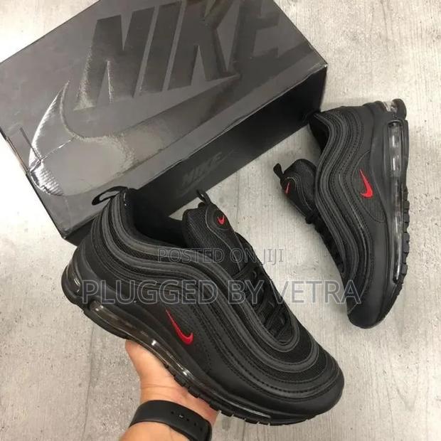 Airmax 97 in a "Black and University Red Colorway".