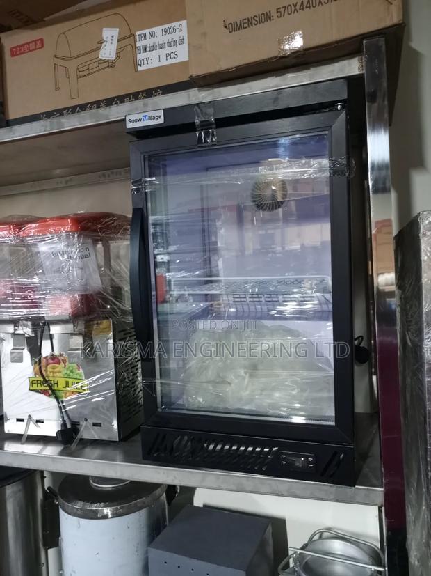 Commercial Showcase Chiller With a Glass Door.