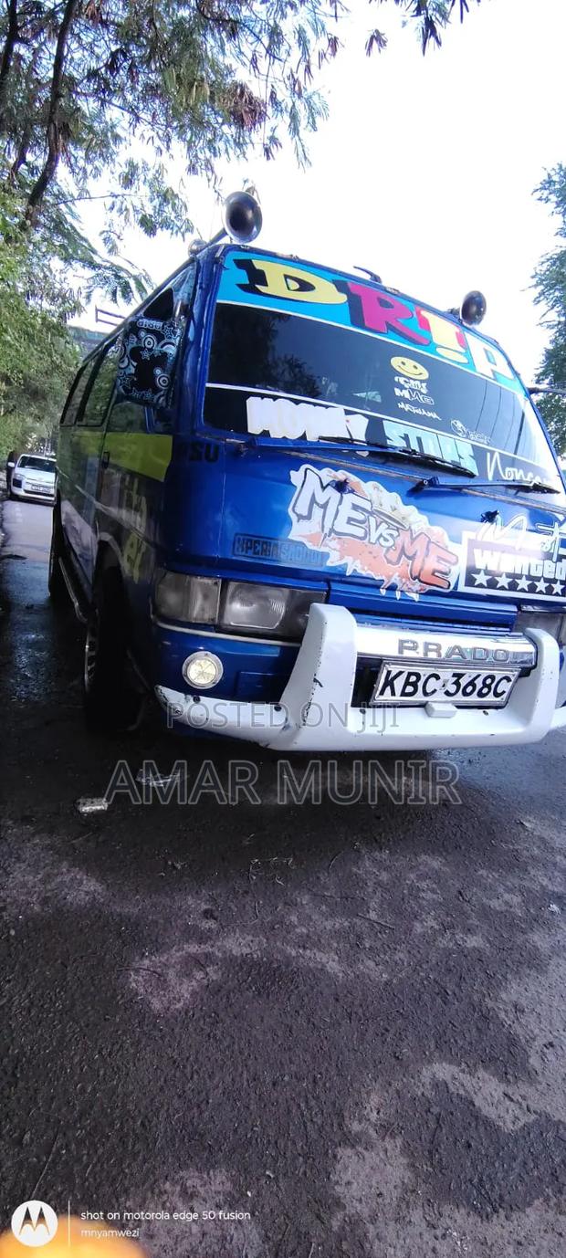 Nissan Caravan (Urvan) 2002 Blue - thumbnail 4