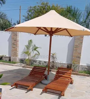 Two Sun Loungers and Un Umbrella 