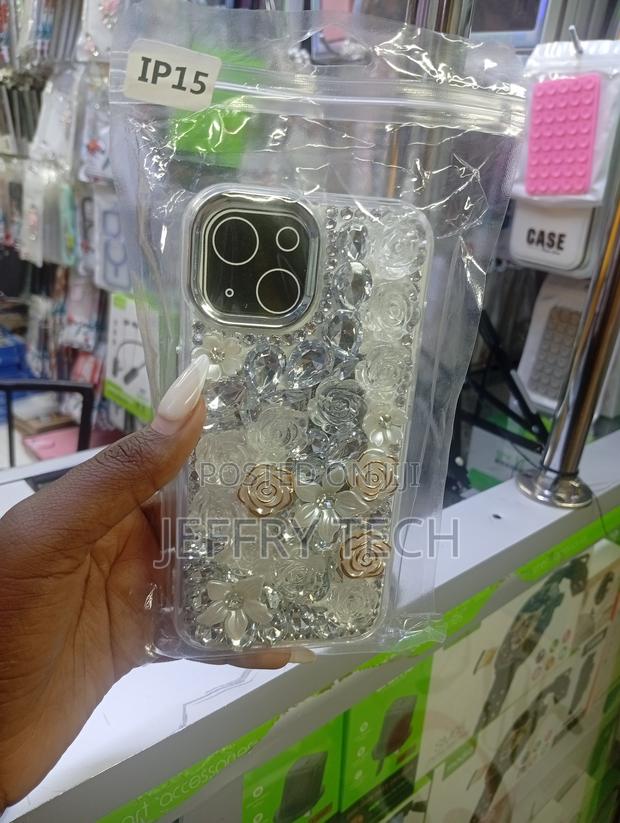 Decorative Floral Rhinestone Phone Case Designed for the iPhone 15.