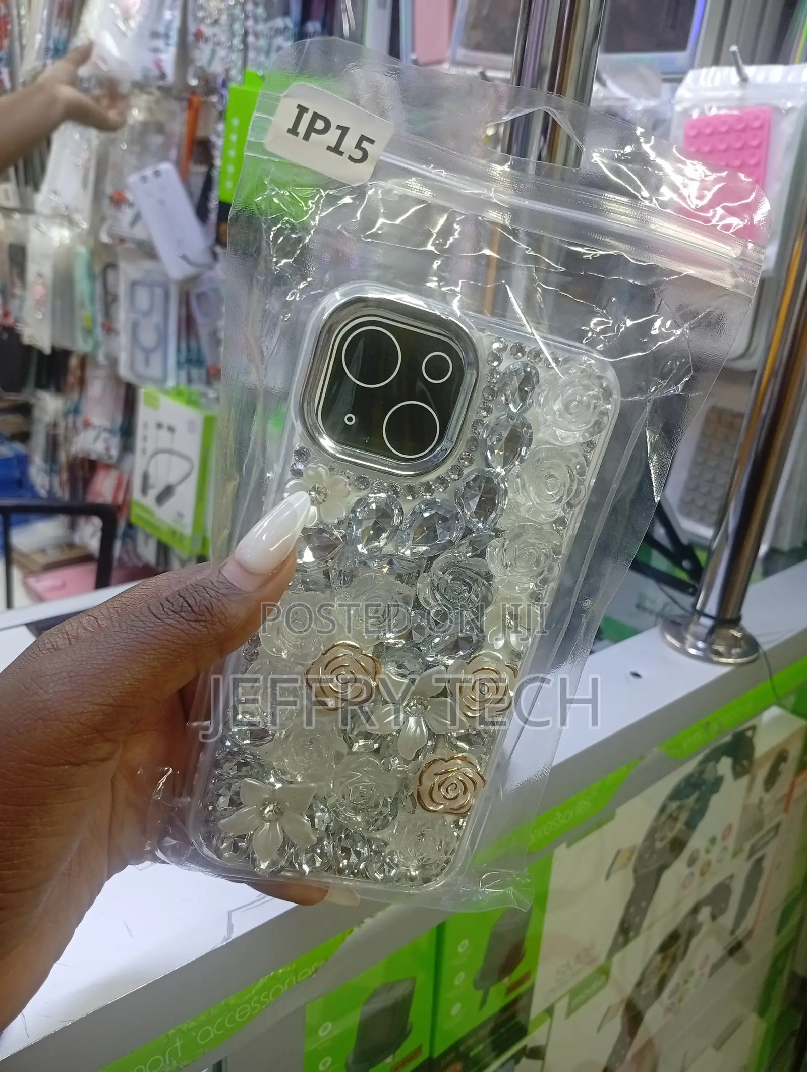 Decorative Floral Rhinestone Phone Case Designed for the iPhone 15.