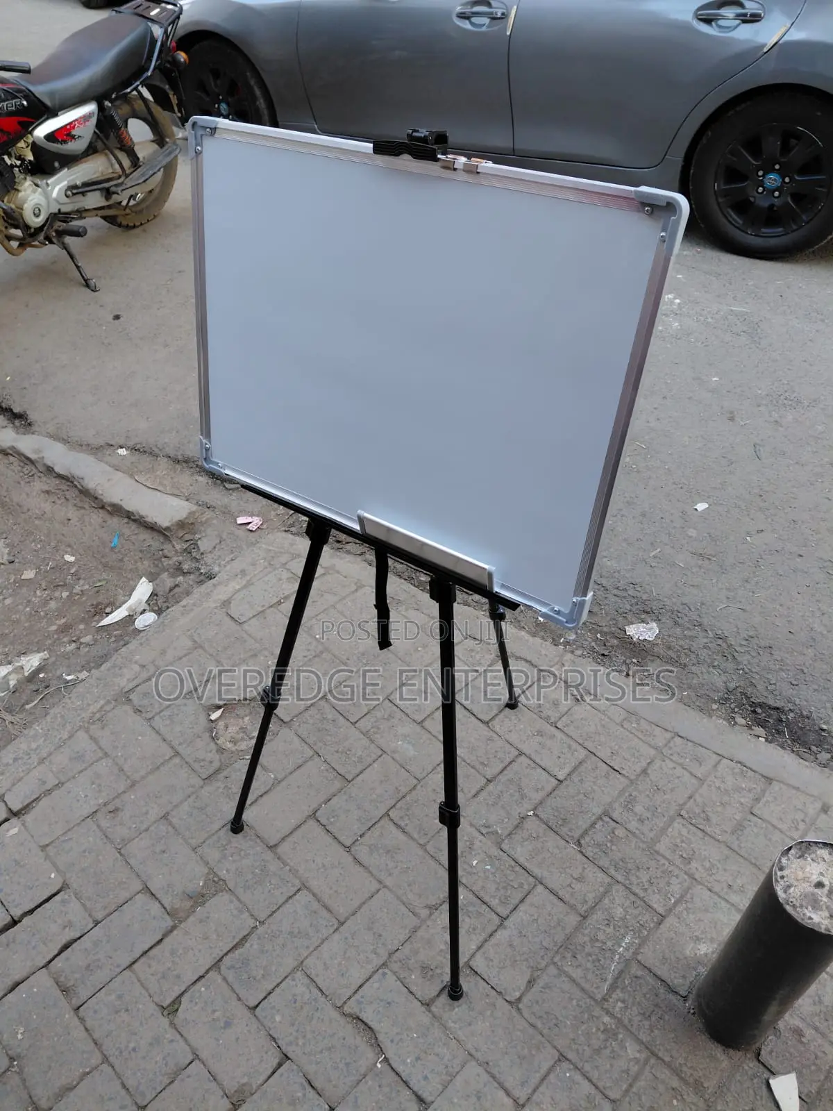 Students Erase Whiteboard With Easel Stand
