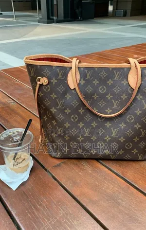 Louis Vuitton Neverfull Brown Handbag - Classy Spacious