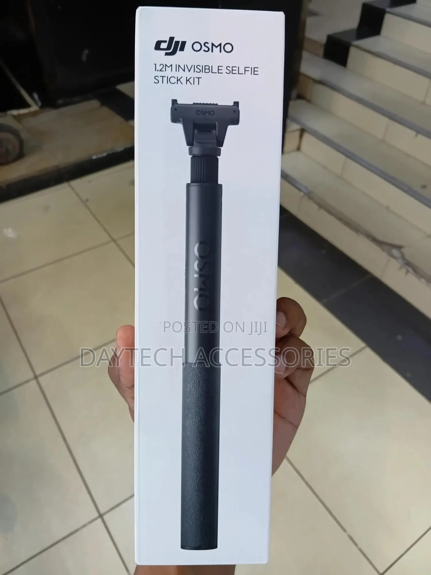This Is a Dji Osmo 1.2m Invisible Selfie Stick Kit in Black.