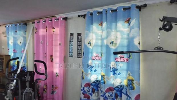 Vibrant Printed Cartoon Drapes for Kids Living Spaces