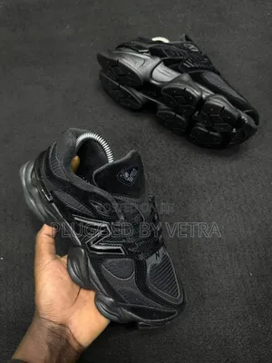 New Balance 9060 "Triple Black" Models.