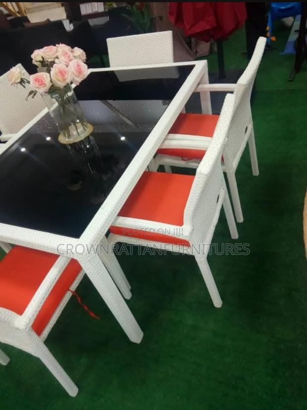 Round Rattan Table With Four Chairs