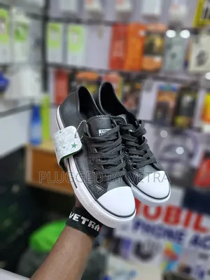 Converse Leather Rubbers in Black-White Colourway.