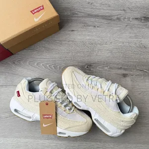 The Nike Air Max 95 Og "Levis - Light Orewood Brown" Denim Sneakers.