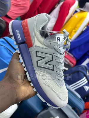New Balance Rc1300 in a Grey, Blue, and Red