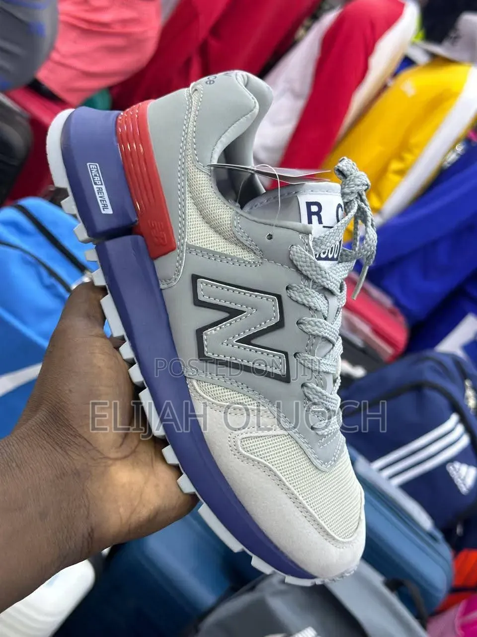 New Balance Rc1300 in a Grey, Blue, and Red
