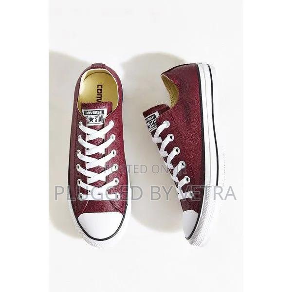 Burgundy Maroon Leather Converse Rubber Shoes.