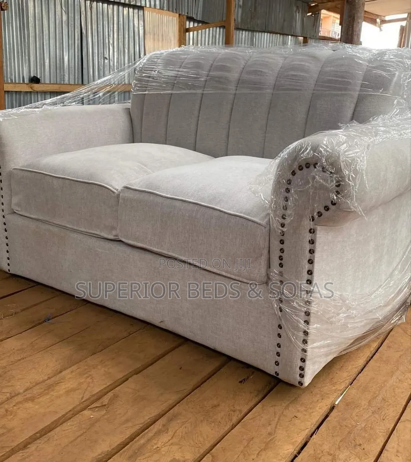 2 Seater Light Grey Sofa