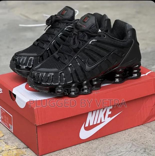 Nike Shox Tl in All-Black/Black Plain Shoes.