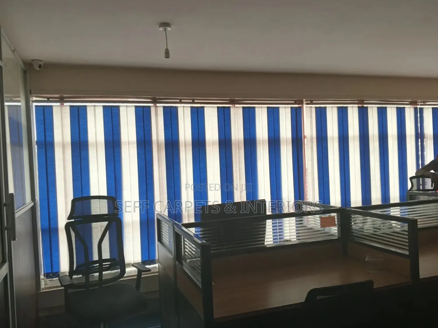 Blue Fabric and White Fabric Vertical Blinds.