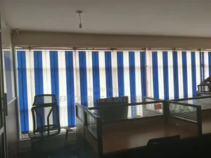 Blue Fabric and White Fabric Vertical Blinds.