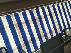 Blue Fabric and White Fabric Vertical Blinds.