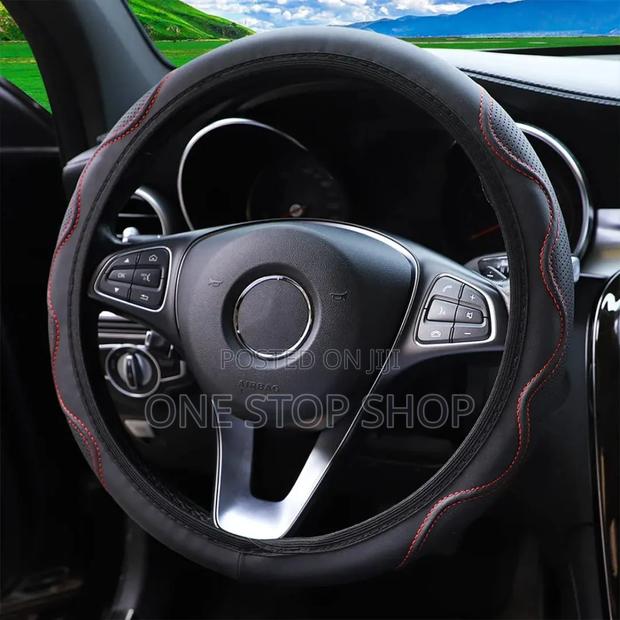 Pu Leather Red Stitching Steering Cover Fitted on a Car - main view
