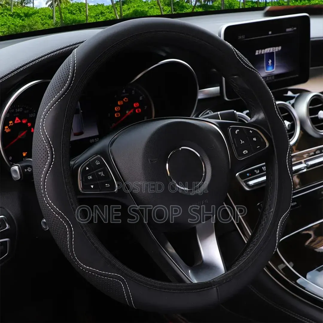 Leather/Suede Steering Wheel Cover With White Stitch Pattern
