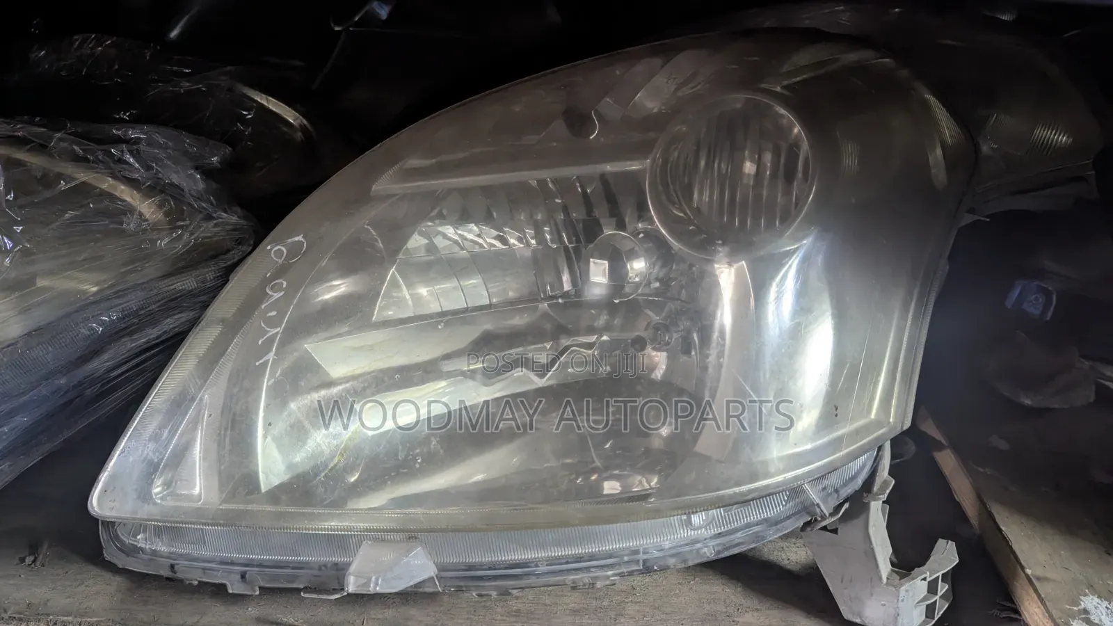Toyota Raum Headlight