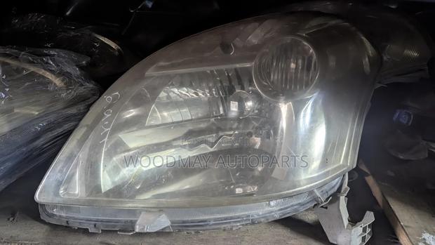 Toyota Raum Headlight