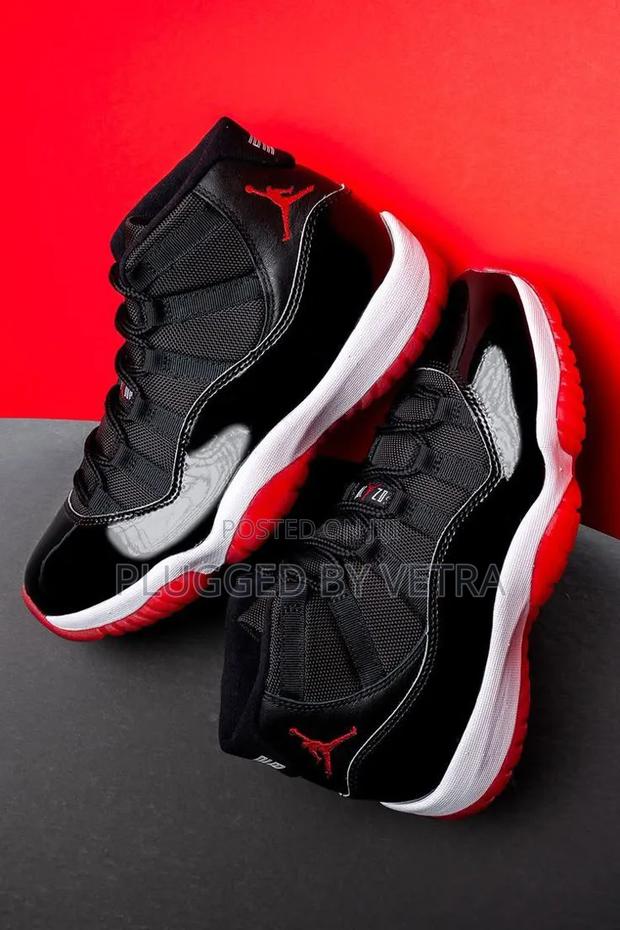 Air Jordan 11 in "Black Red White Colourway'" Sneakers.