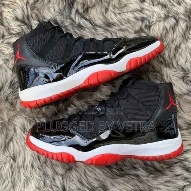 Air Jordan 11 in "Black Red White Colourway'" Sneakers. - thumbnail 2