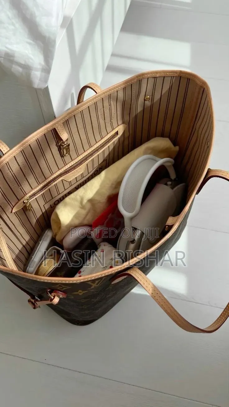 Louis Vuitton Neverfull Brown Handbag - Classy Spacious