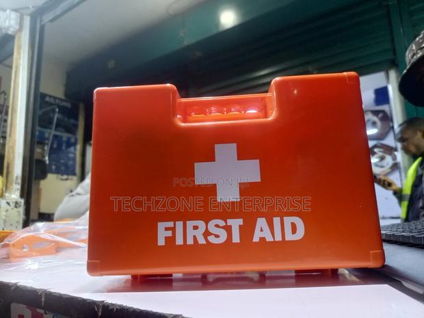 Red First Aid Kit Box Used in Different Places 