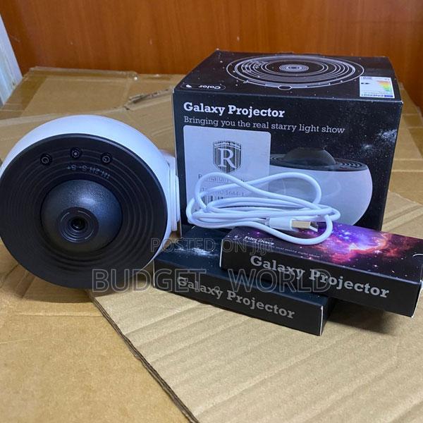 Galaxy Night Light Projector With 13 Interchangeable Space Discs