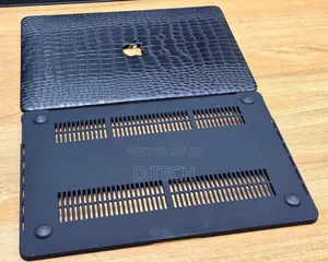 Macbook With Leather Finish Cases