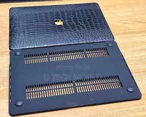 Macbook With Leather Finish Cases