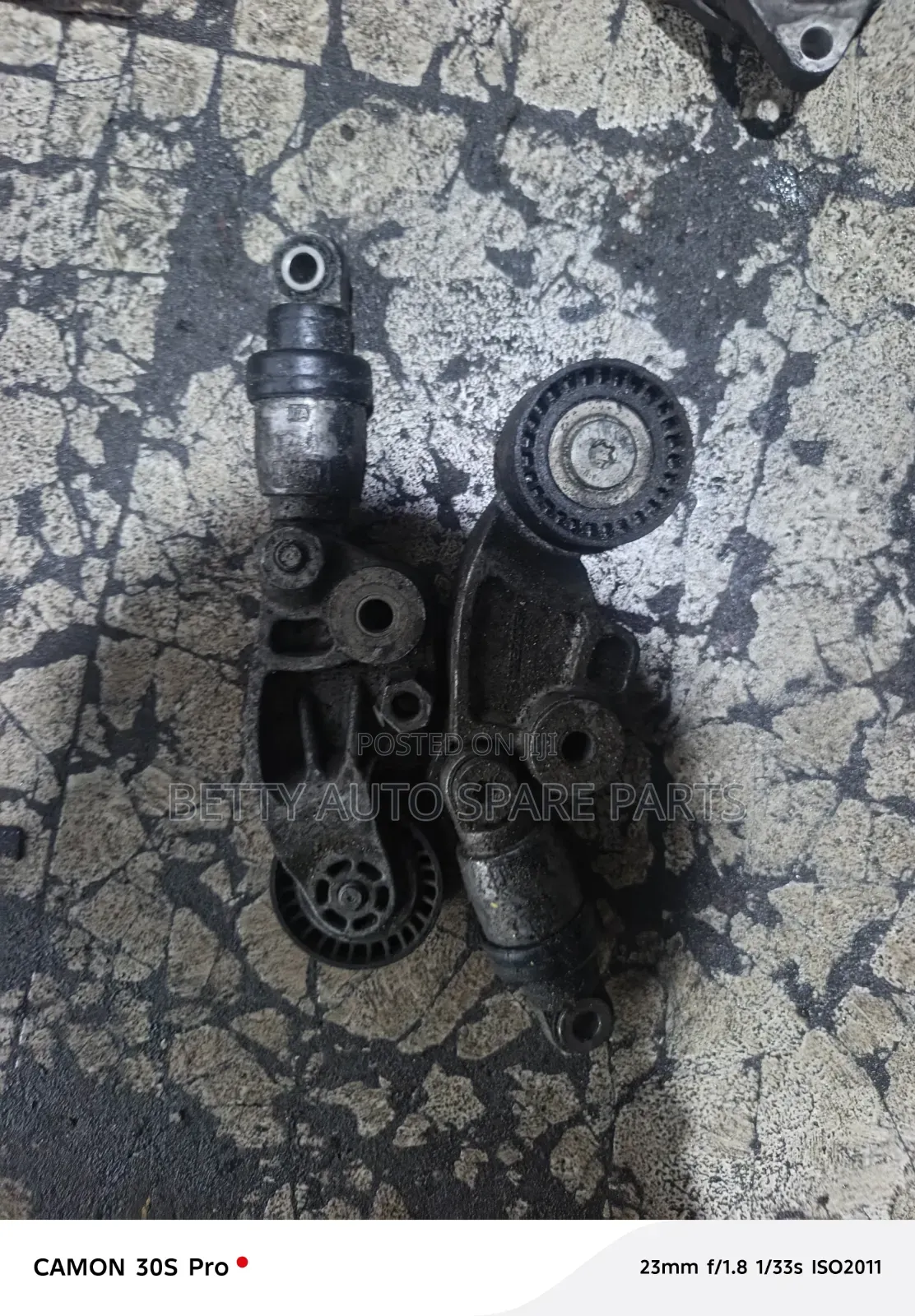 Mazda Demio Tensioner