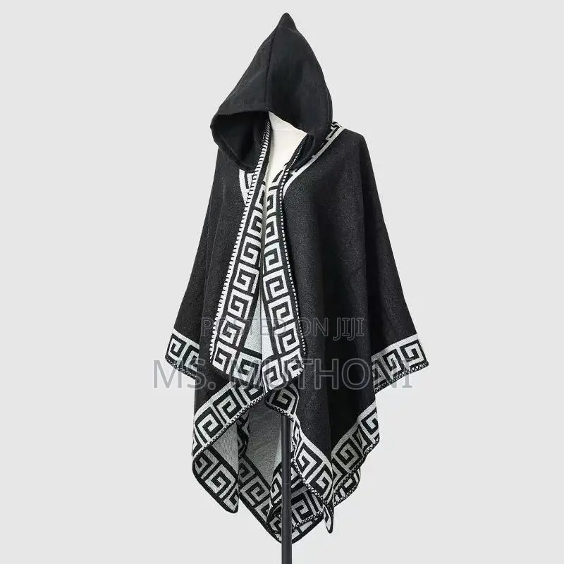 *Ladies Patterned Poncho With a Hood