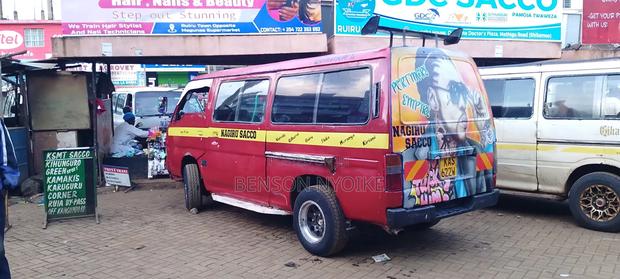Nissan Caravan (Urvan) 2009 Red - thumbnail 2
